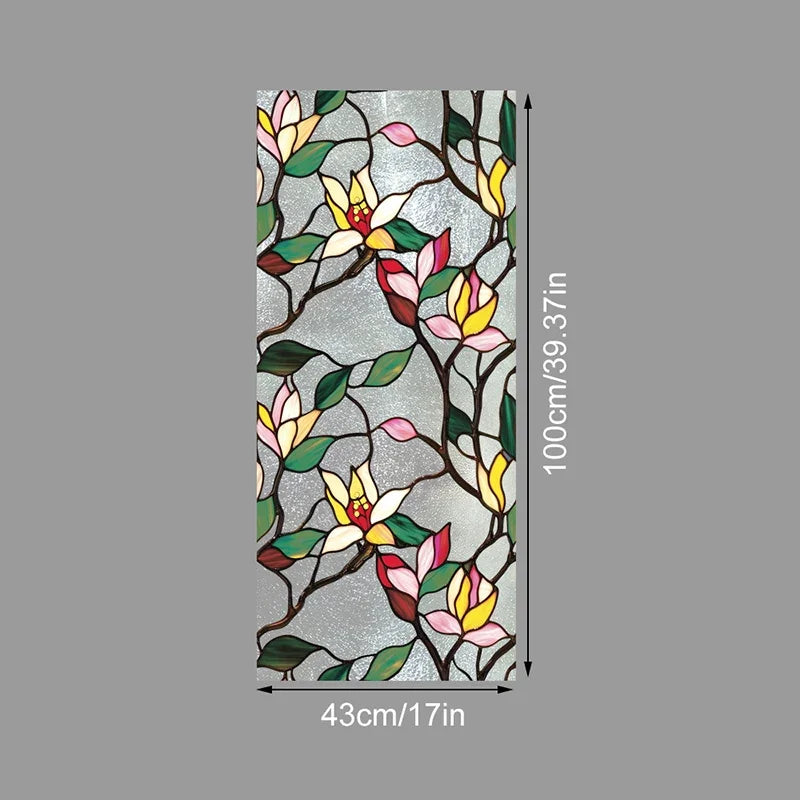 Decorative PVC stained glass window film featuring floral patterns in pink, yellow, and green on a gray background