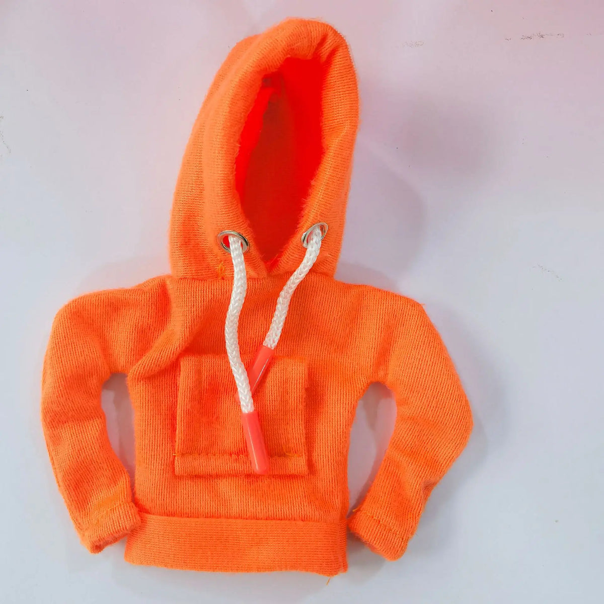 An orange Gear Shift hoodie cover with a hood and drawstring is displayed on a white background.
