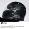 Black motorcycle helmet with a clear visor and an integrated Bluetooth headset display