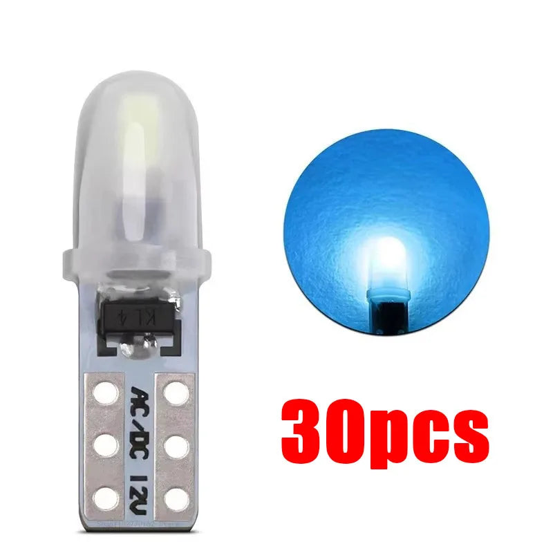 A set of 30 T5 LED dashboard and license plate bulbs, showing a clear bulb and a blue light beam.