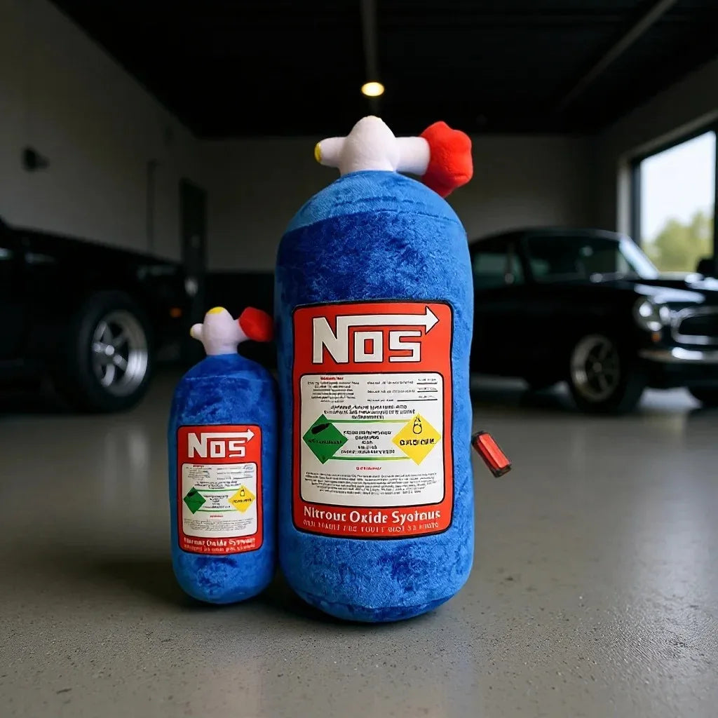 A blue bottle shaped like a car neck and lumbar pillow set with an orange cap and red accents.