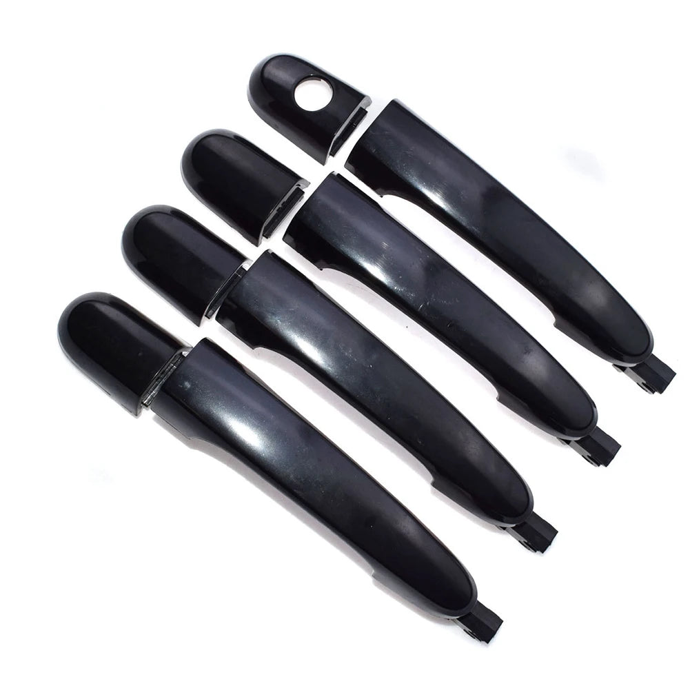 Five black OEM door handles for a KIA Sportage vehicle.