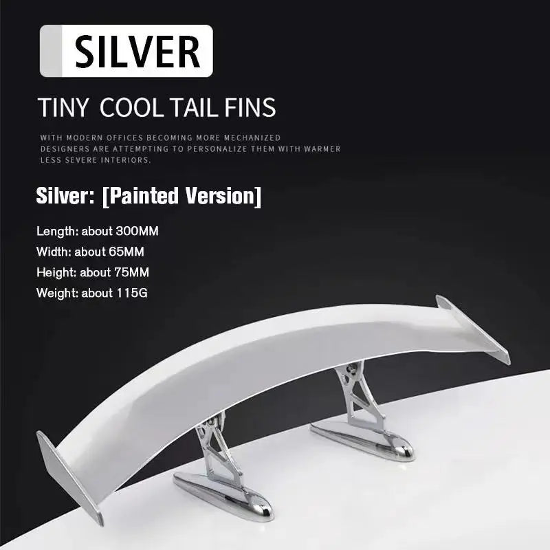 Silver tiny cool tail fins with a curved design shown against a white background.
