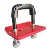 A heavy duty trailer hitch clamp and isolator with a black handle and red mounting plate.
