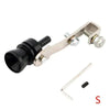 A silver metal whistle attachment with a black nozzle and a small metal rod is shown.