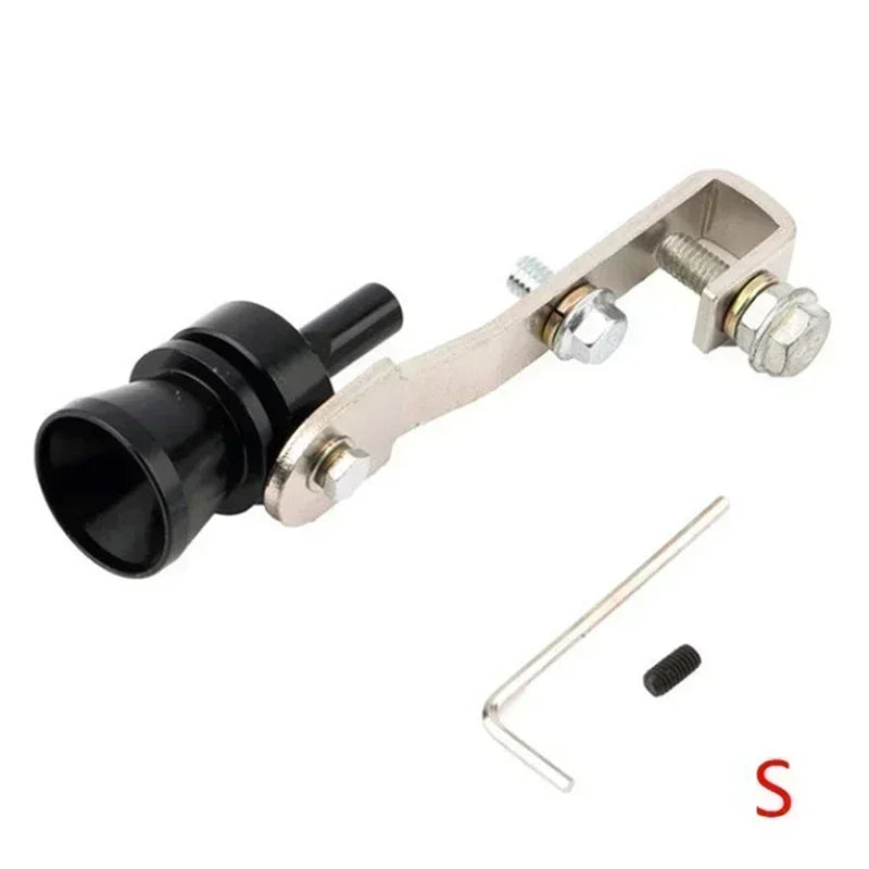 A silver metal whistle attachment with a black nozzle and a small metal rod is shown.