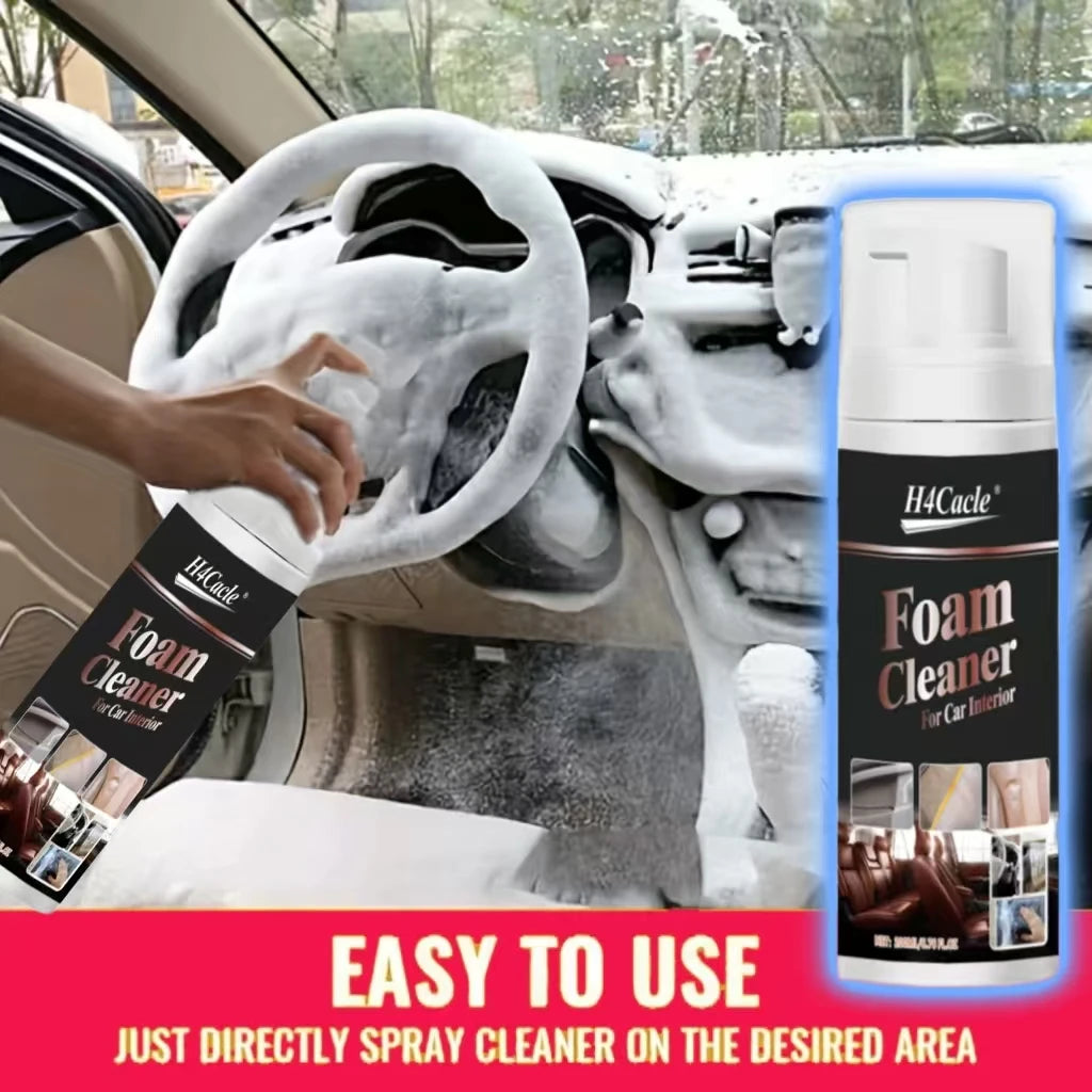 Spray bottle of H4Cacle Foam Cleaner for car interior next to a car steering wheel