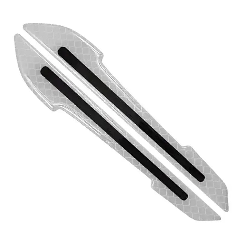 A pair of reflective black strips designed to be installed on car mirrors or door bumpers.