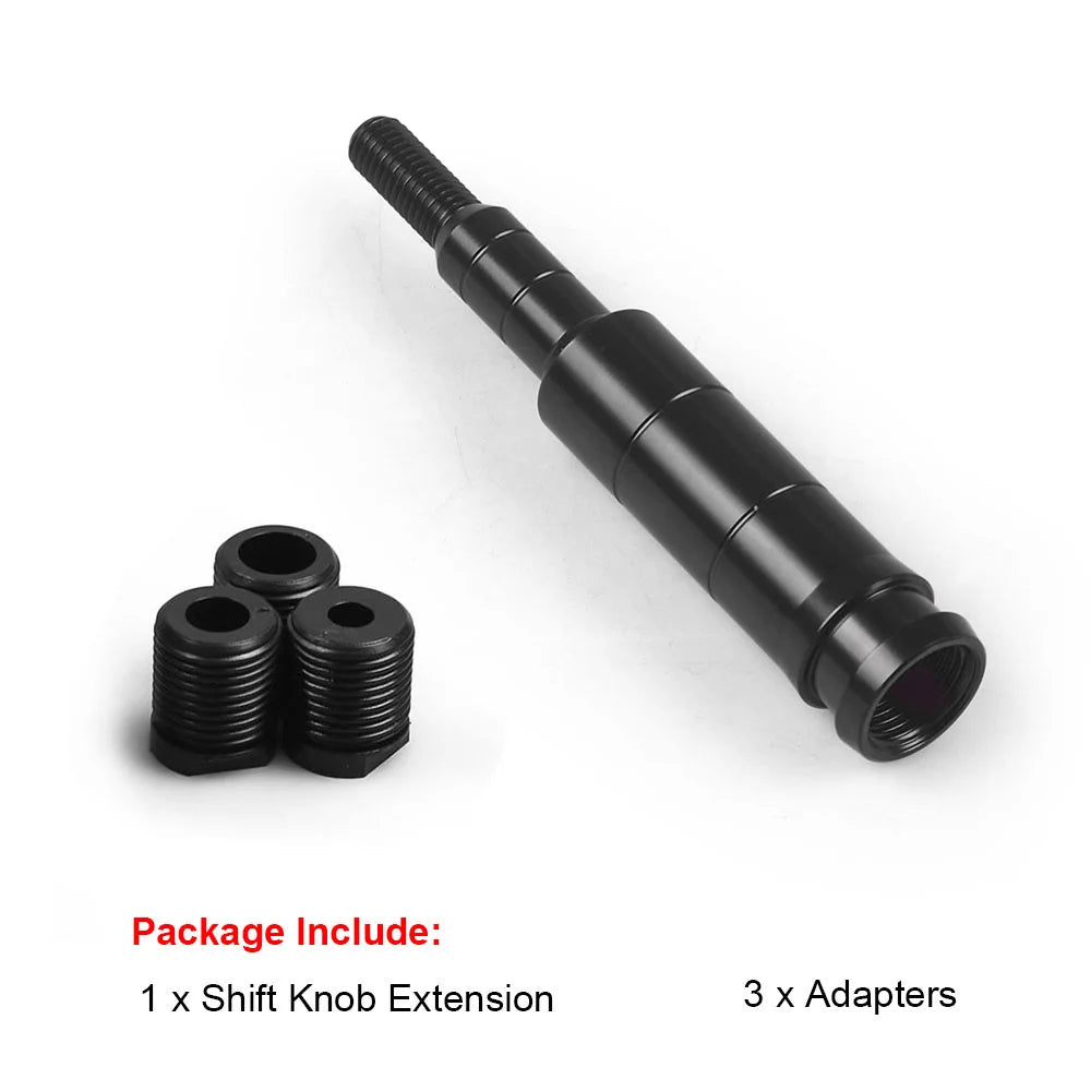 A black aluminum gear knob extension and three adapters for a Honda shift lever.