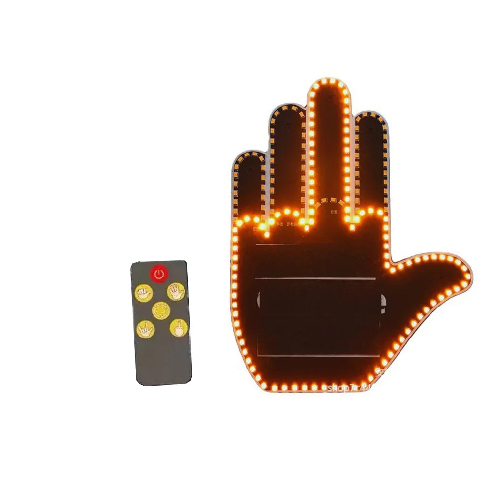 A close-up of a hand-shaped finger light illuminating various buttons and features.