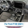 Carbon fiber grain interior trim kit for a Ford F150 showing the dashboard and steering wheel area.