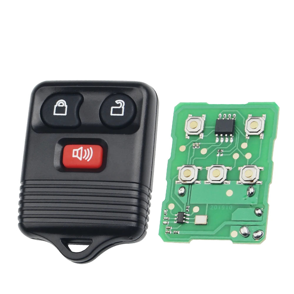 A black universal remote car key transmitter device and its corresponding green circuit board.
