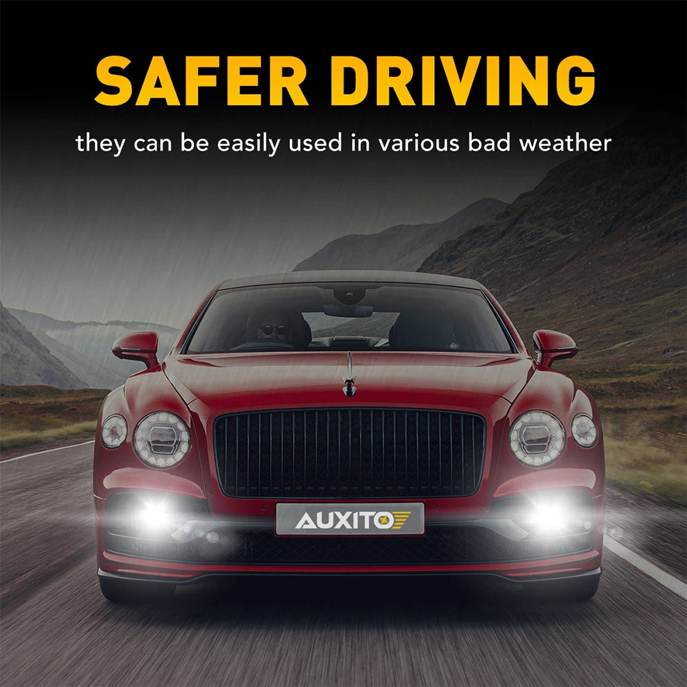 A red Audi car with amber yellow CANBUS LED fog lights on, driving on a road.