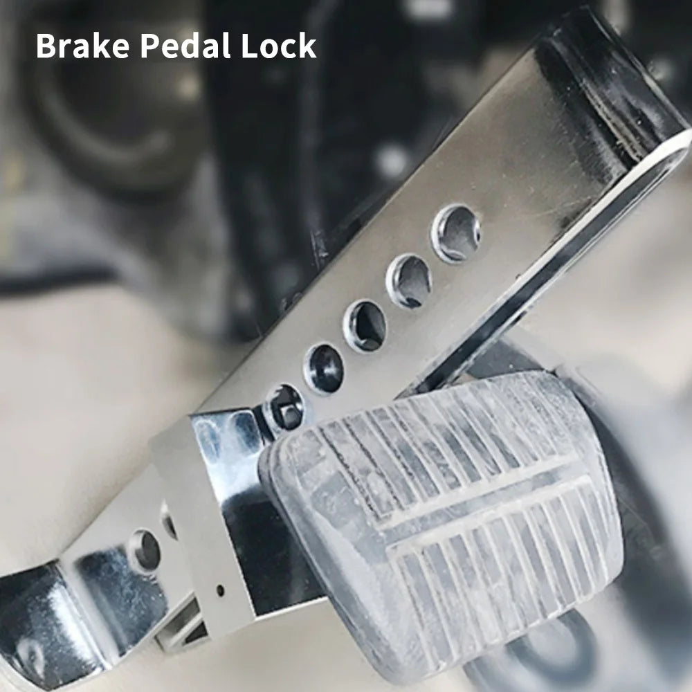 Stainless steel brake pedal lock with a textured grip for securing bicycle pedals.