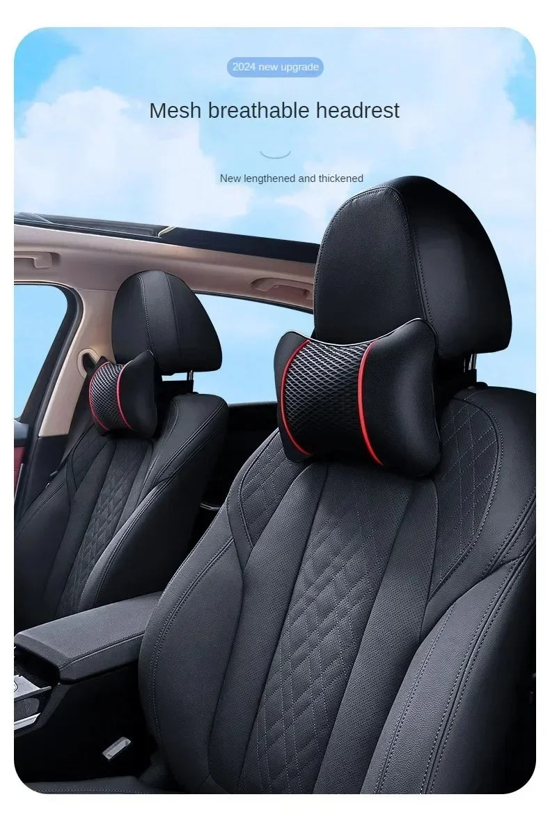 A close-up view of a black mesh breathable headrest and neck support cushion installed in a car seat.