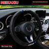 Black steering wheel cover with red stitching and Sport branding installed in a car interior.