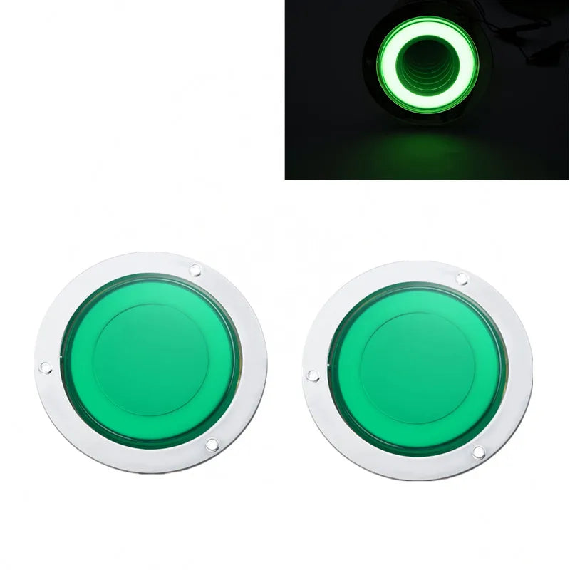 A pair of round green LED truck tail lights with a 3D halo effect.