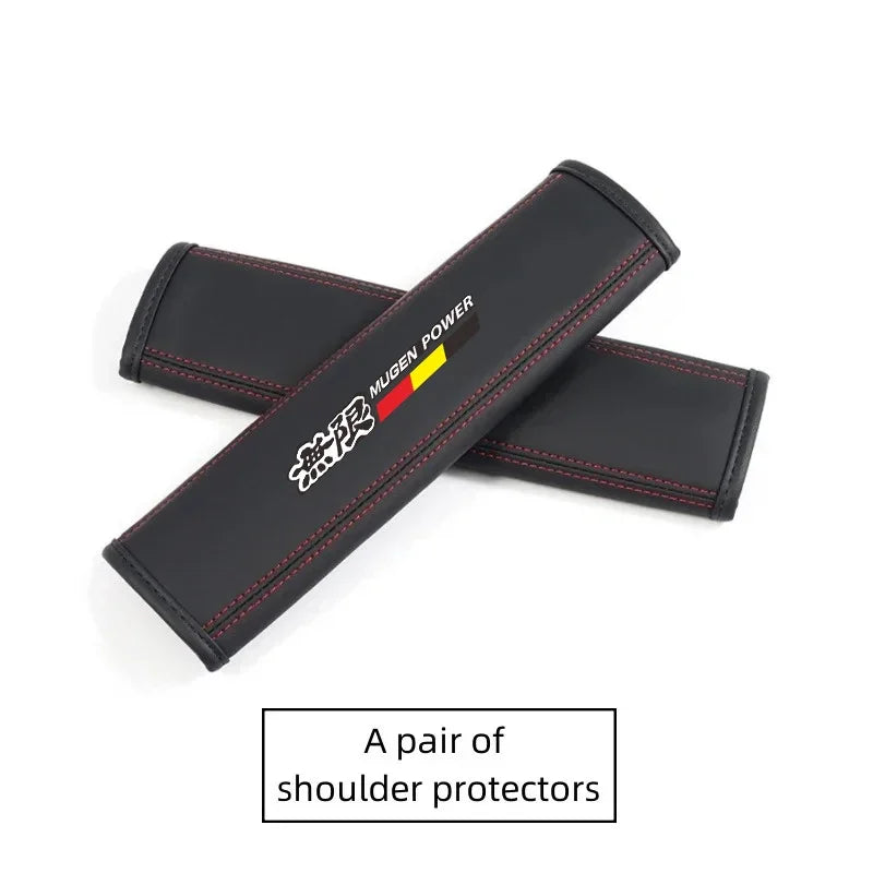 A pair of black PU leather shoulder protectors with a yellow and red accent stripe