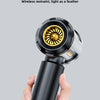 A hand holds a black cordless handheld vacuum cleaner with a gold nozzle, demonstrating its light weight.