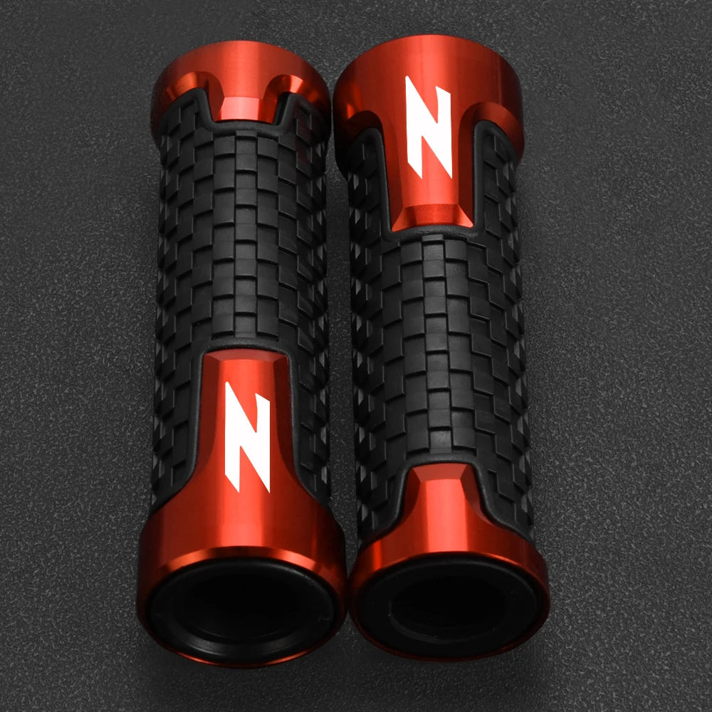 A pair of motorcycle lever and handguard protector sets in red and black.