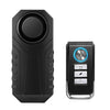A black wireless bicycle and motorcycle alarm system device shown from the front and side.