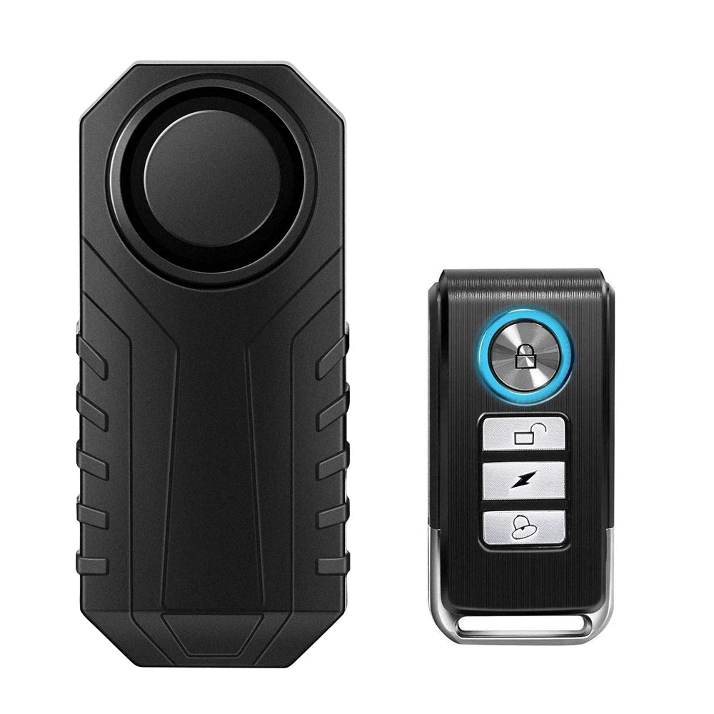 A black wireless bicycle and motorcycle alarm system device shown from the front and side.