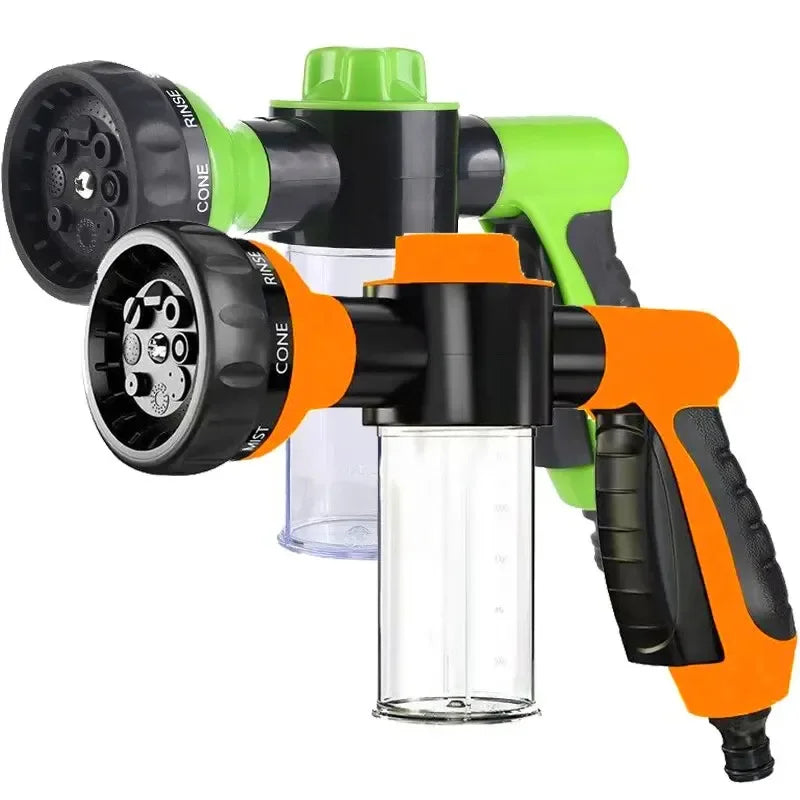 An orange and green high pressure foam lance car wash sprayer with a clear bottle attachment.