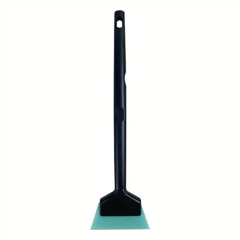 A black car window film installation tool with a green plastic base.