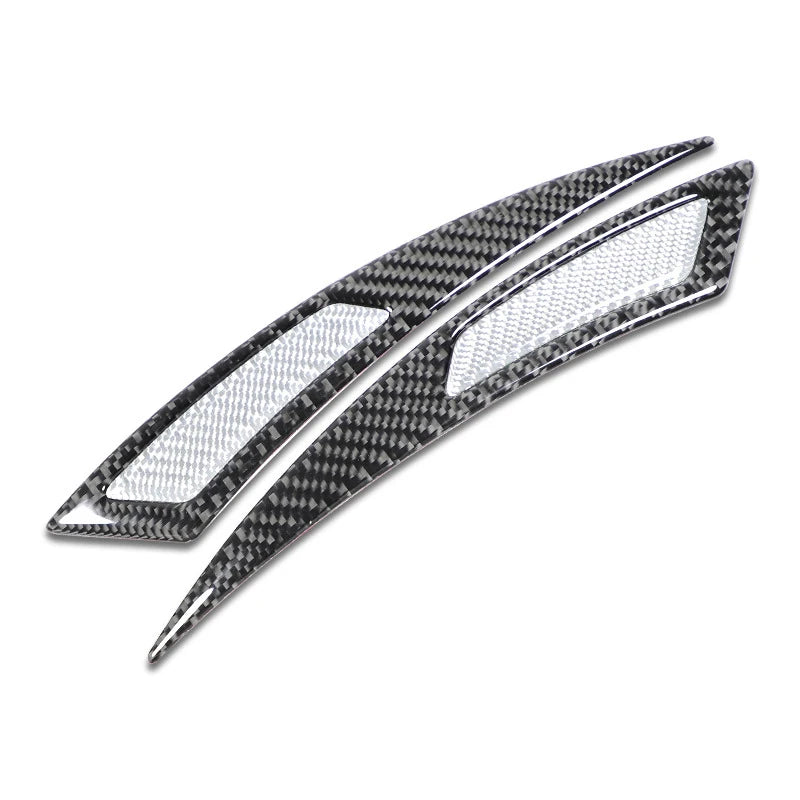 Carbon fiber car wheel eyebrow protector trim with a textured finish