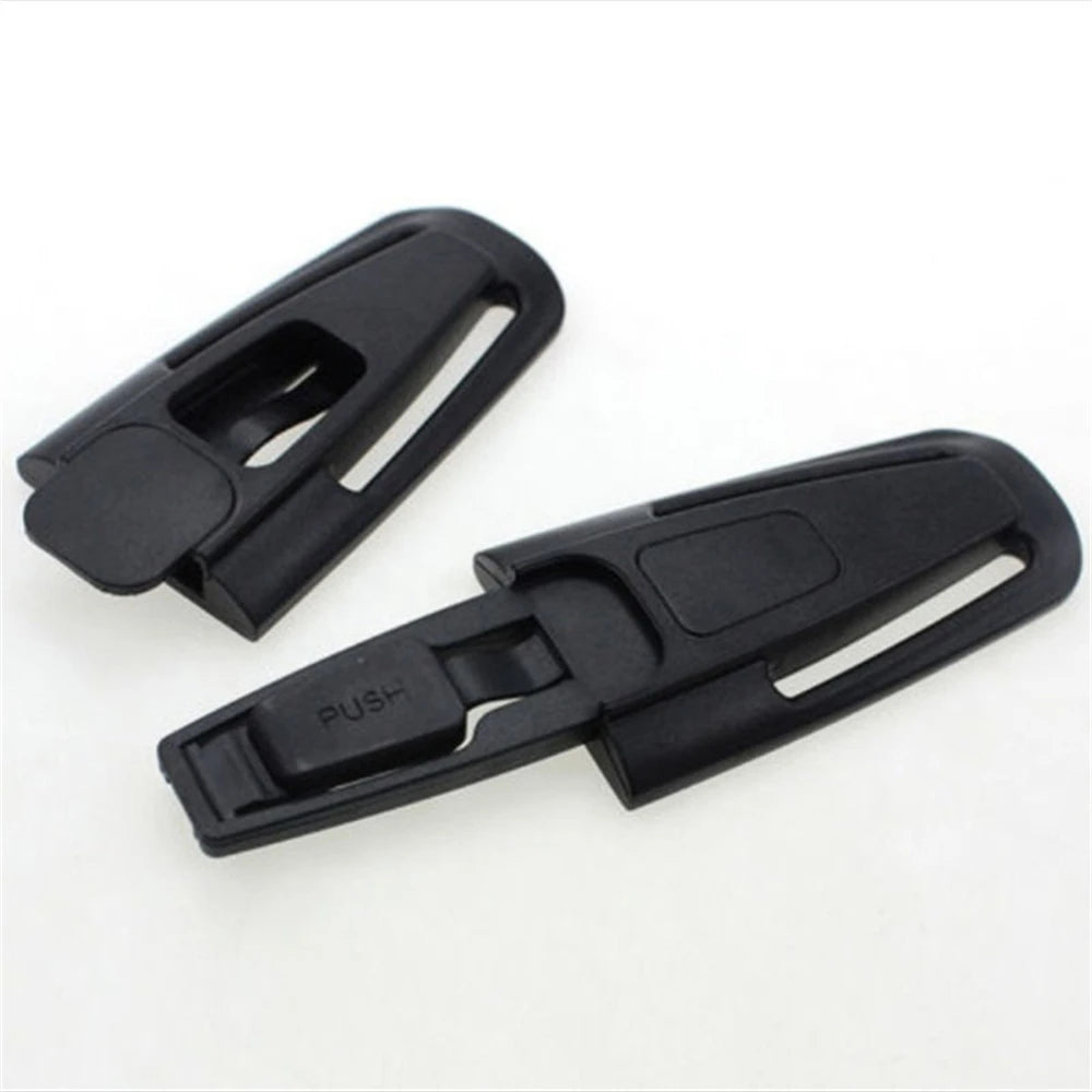 Black plastic car seat belt clip designed for child safety harnesses
