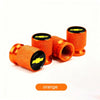 Orange aluminum tire valve covers with black and yellow Chevrolet emblems