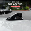Black shark fin roof antenna cover installed on a white Honda Accord car.