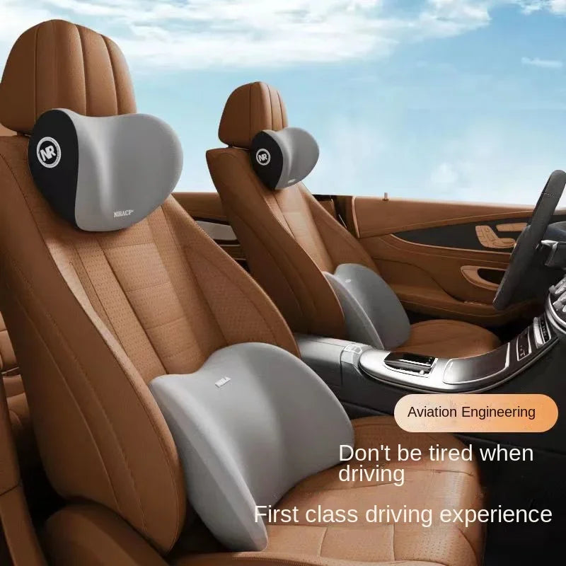 First class driving experience featuring a universal car headrest neck support pillow in gray and brown leather seating.