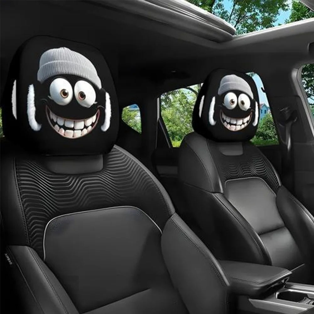 Black car seat headrest covers featuring decorative ghost faces with white fur and teeth
