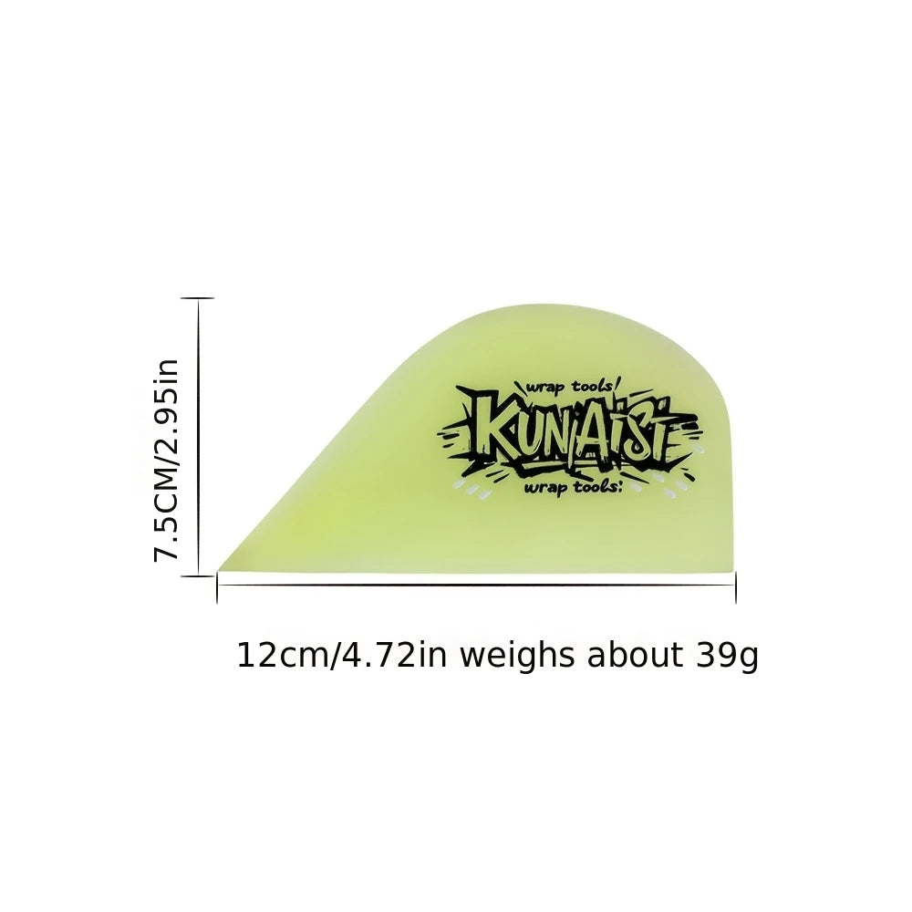 A yellow, curved tool for scraping invisible car film, measuring 7.5cm long and weighing about 39g.