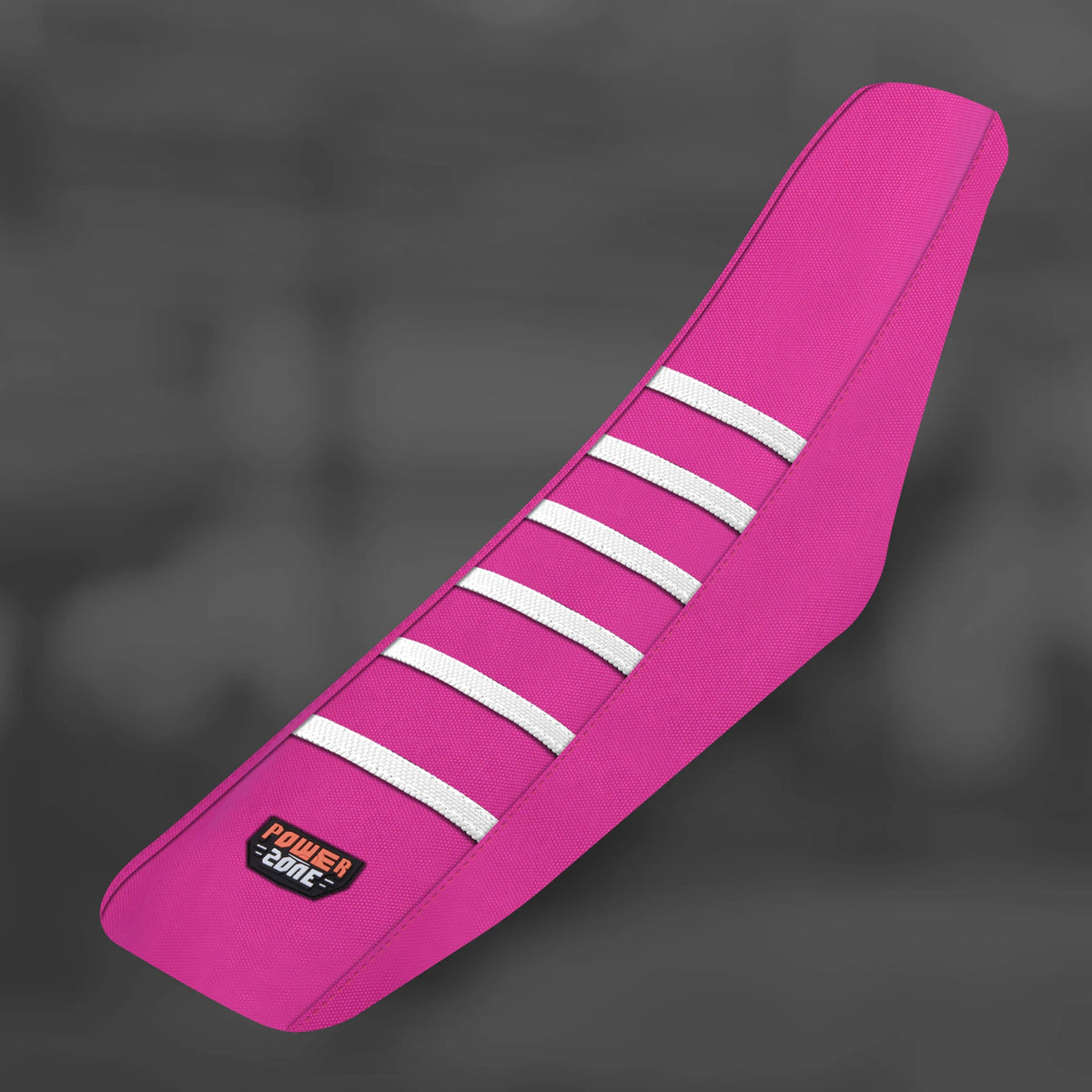A bright pink motorcycle seat cover featuring white stripes on a dark gray background.