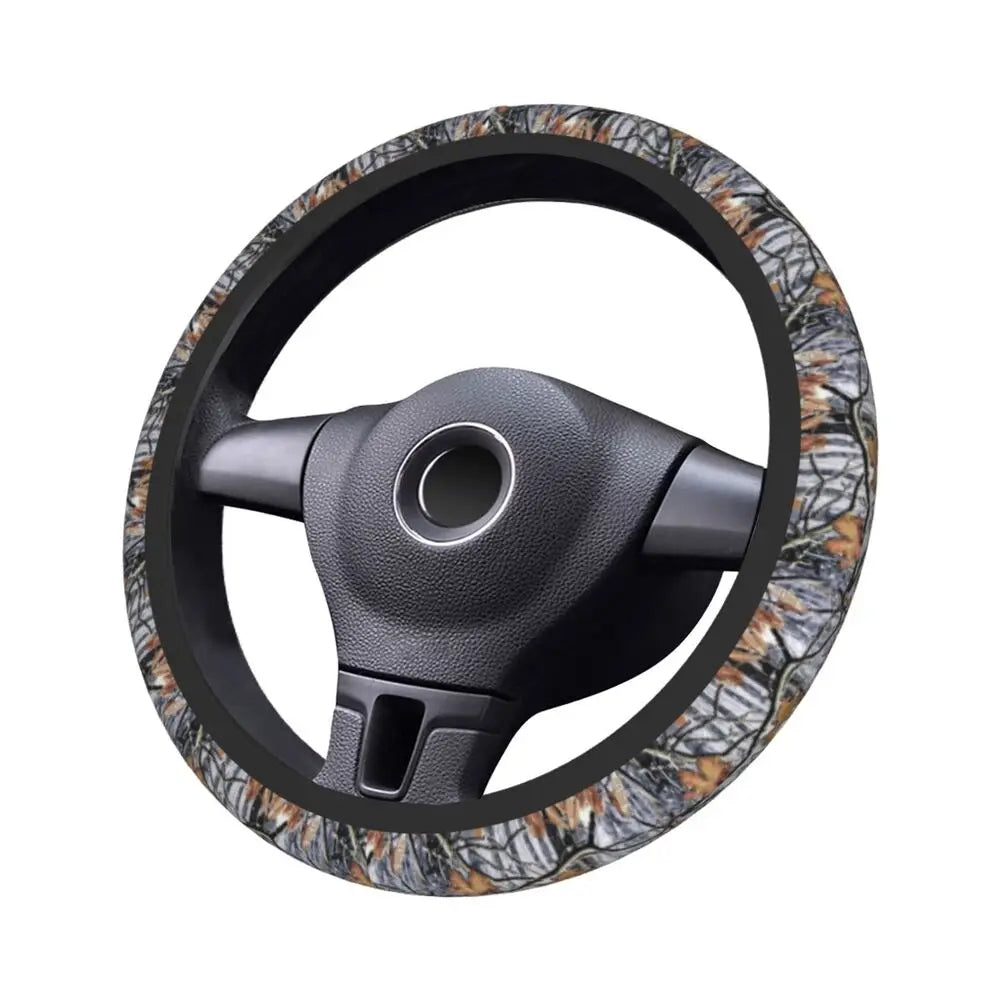Black steering wheel covers with a camouflage pattern featuring brown and gray tones.