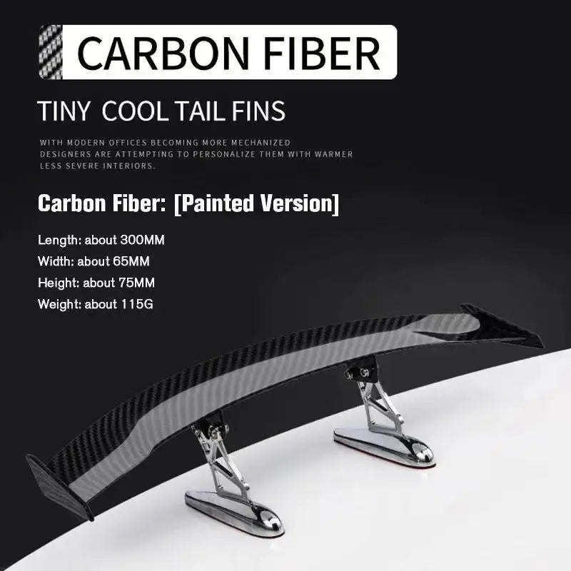 A black painted carbon fiber rear car spoiler wing with mounting hardware.