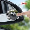 Two blind spot mirrors are shown being installed on a car's side mirror.