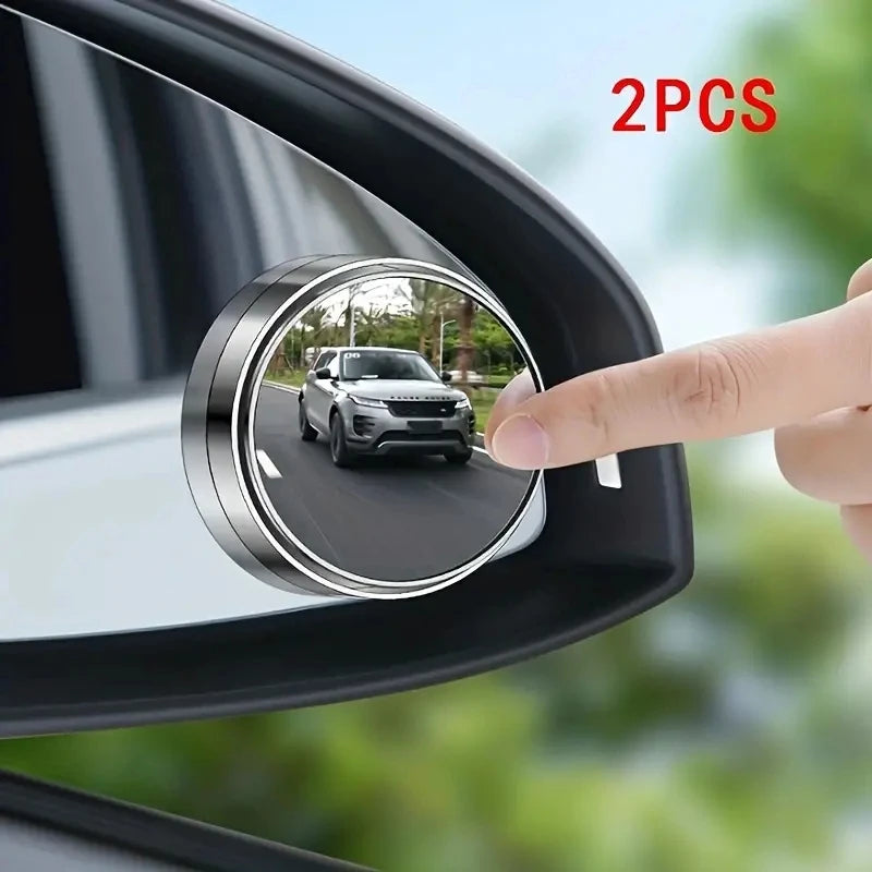 Two blind spot mirrors are shown being installed on a car's side mirror.