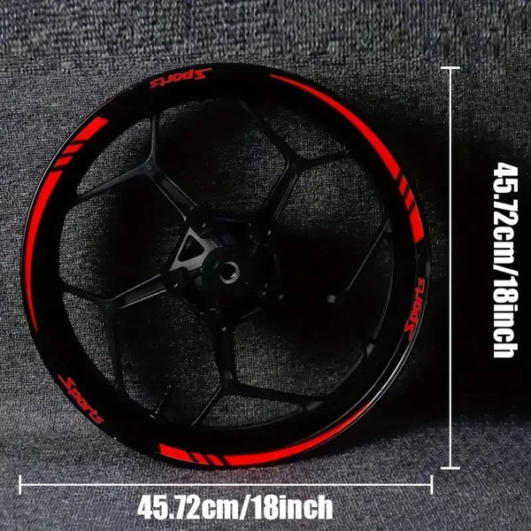 A black motorcycle wheel rim with red reflective decals shown against a dark background.