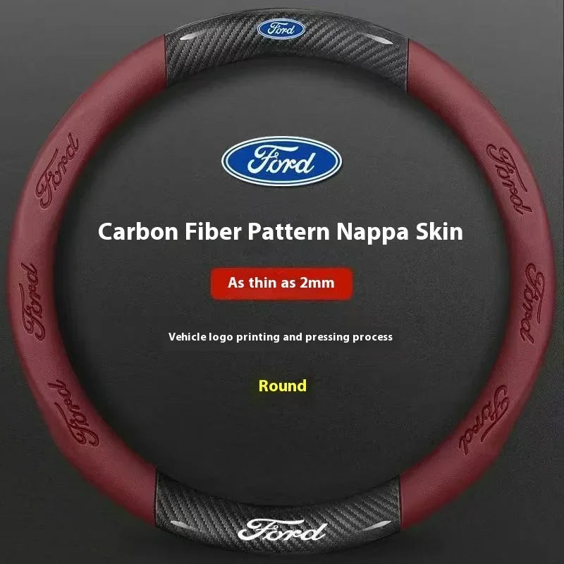 A round, maroon carbon fiber patterned nappa skin steering wheel cover for a Ford vehicle.