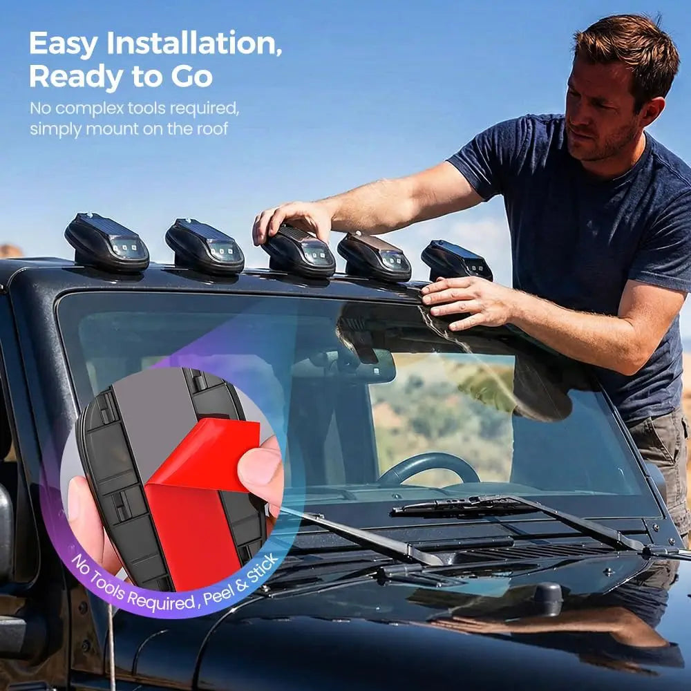 A man installs solar-powered RGB roof marker lights on a vehicle, demonstrating easy installation.