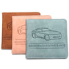 Three leather document holders in brown, pink, and blue-green shades featuring car silhouettes.