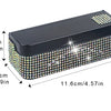 A rectangular coin storage box with a black lid and a sparkling, multicolored surface, shown with dimensions.