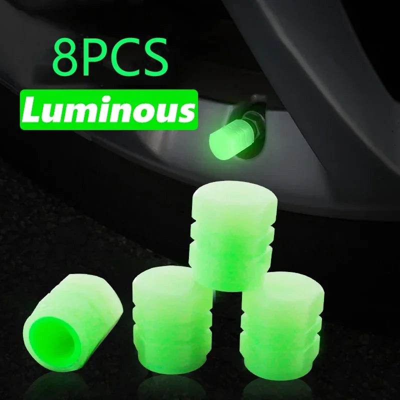 Huit bouchons de vanne verts lumineux présentés sur une surface sombre.