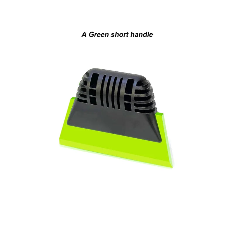 A black squeegee with a green short handle for window and surface cleaning.