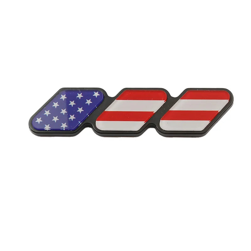 Three separate 3D decals featuring the American flag design in blue stars and red stripes for car grills