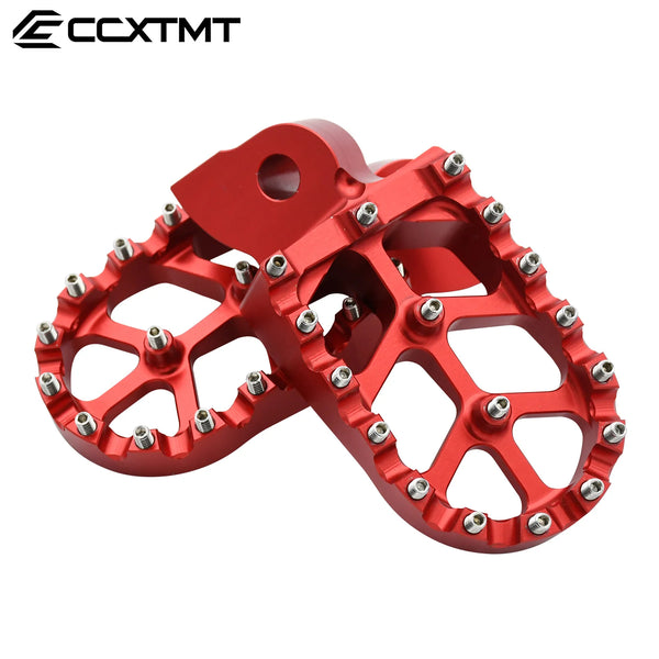 A pair of red CNC footrest pedals for a Yamaha motorcycle.