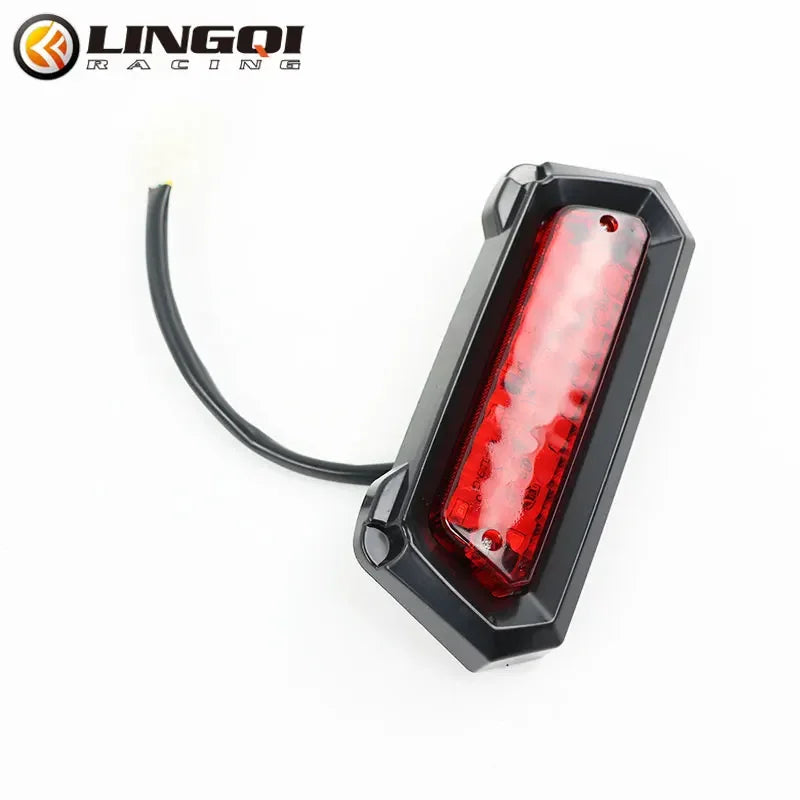 Universal LED motorcycle brake tail light with a black housing and red lens.